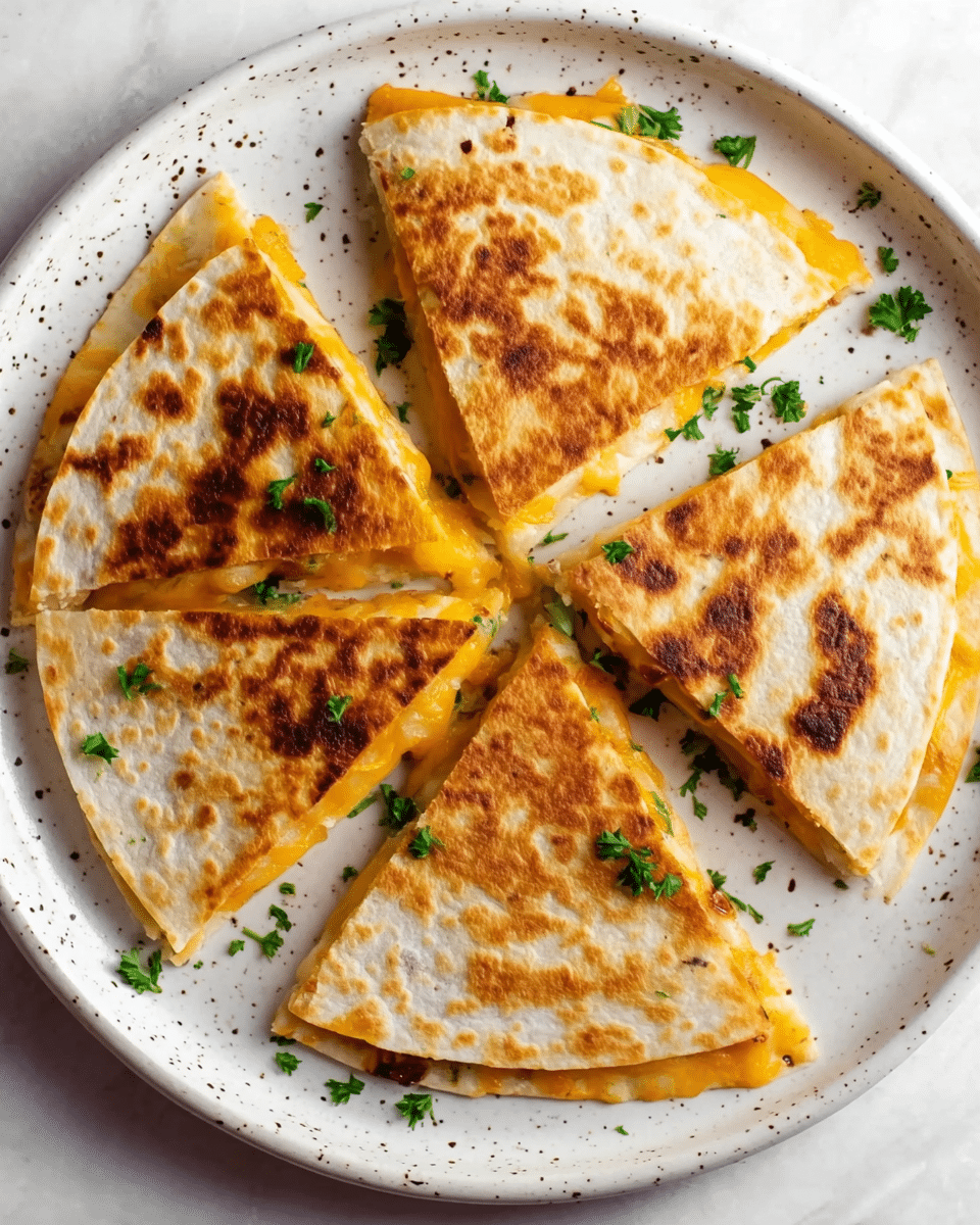 The image shows five triangular slices of quesadilla neatly arranged in a white speckled plate. Each slice has a golden-brown toasted tortilla with spots of darker brown from grilling, and a visible layer of melted orange-yellow cheese peeking out from between two tortillas. Small green parsley leaves are sprinkled on top of the quesadillas and on the plate, adding a fresh contrast to the warm colors of the dish. The background surface is white marbled, giving a clean and bright setting. Photo taken with an iphone --ar 4:5 --v 7
